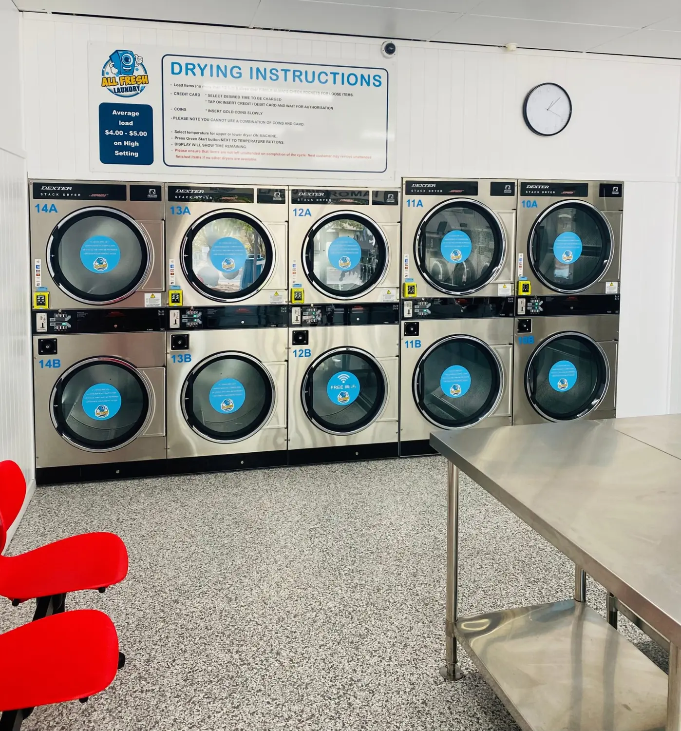 Commercial laundry machines inside Weston Creek Laundromat